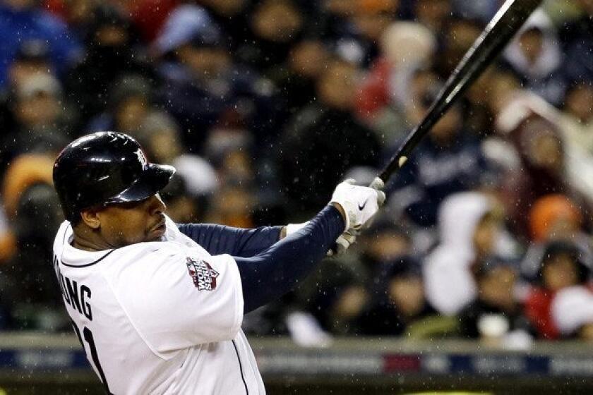 Tigers designated hitter Delmon Young hits a home run against the Giants in Game 4 of the World Series last month.