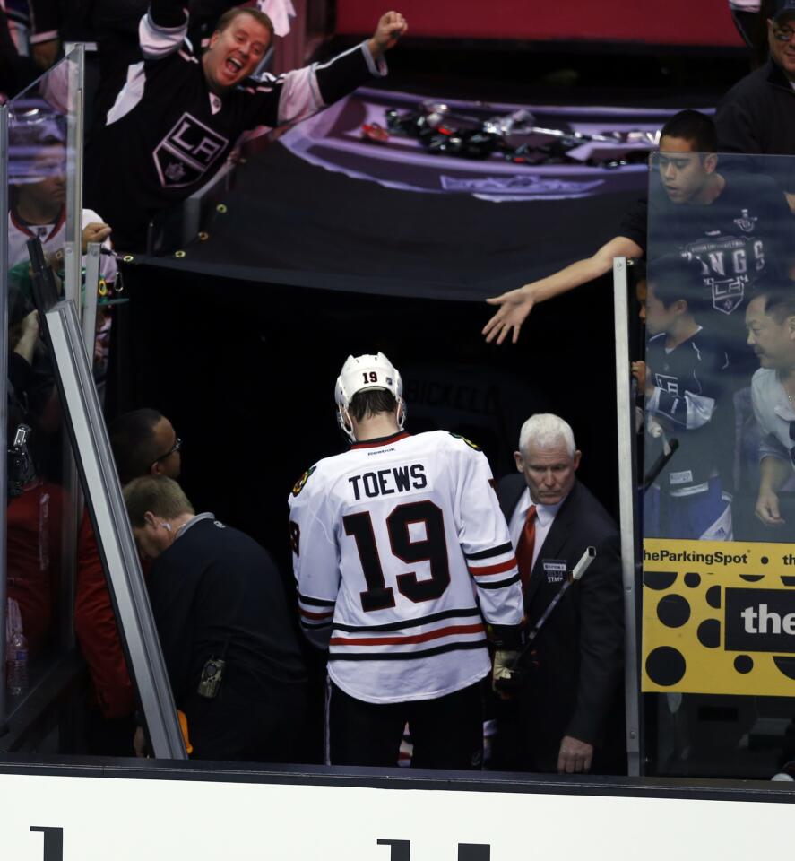 Jonathan Toews heads to the dressing room after the 4-3 loss to the Kings.