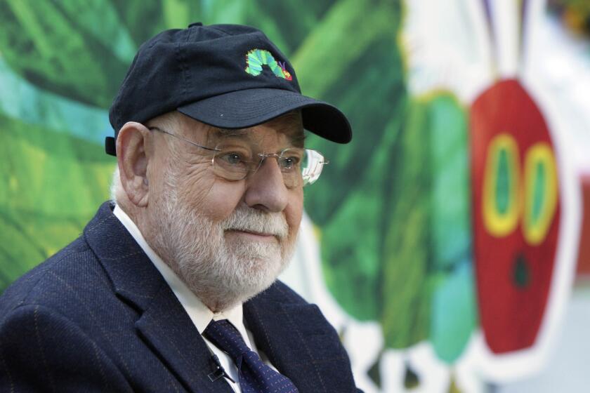 File - Author Eric Carle reads his classic children's book "The Very Hungry Caterpillar" on the NBC "Today" television program in New York on Oct. 8, 2009, as part of Jumpstart's 4th annual National Read for the Record Day. (AP Photo/Richard Drew, File)