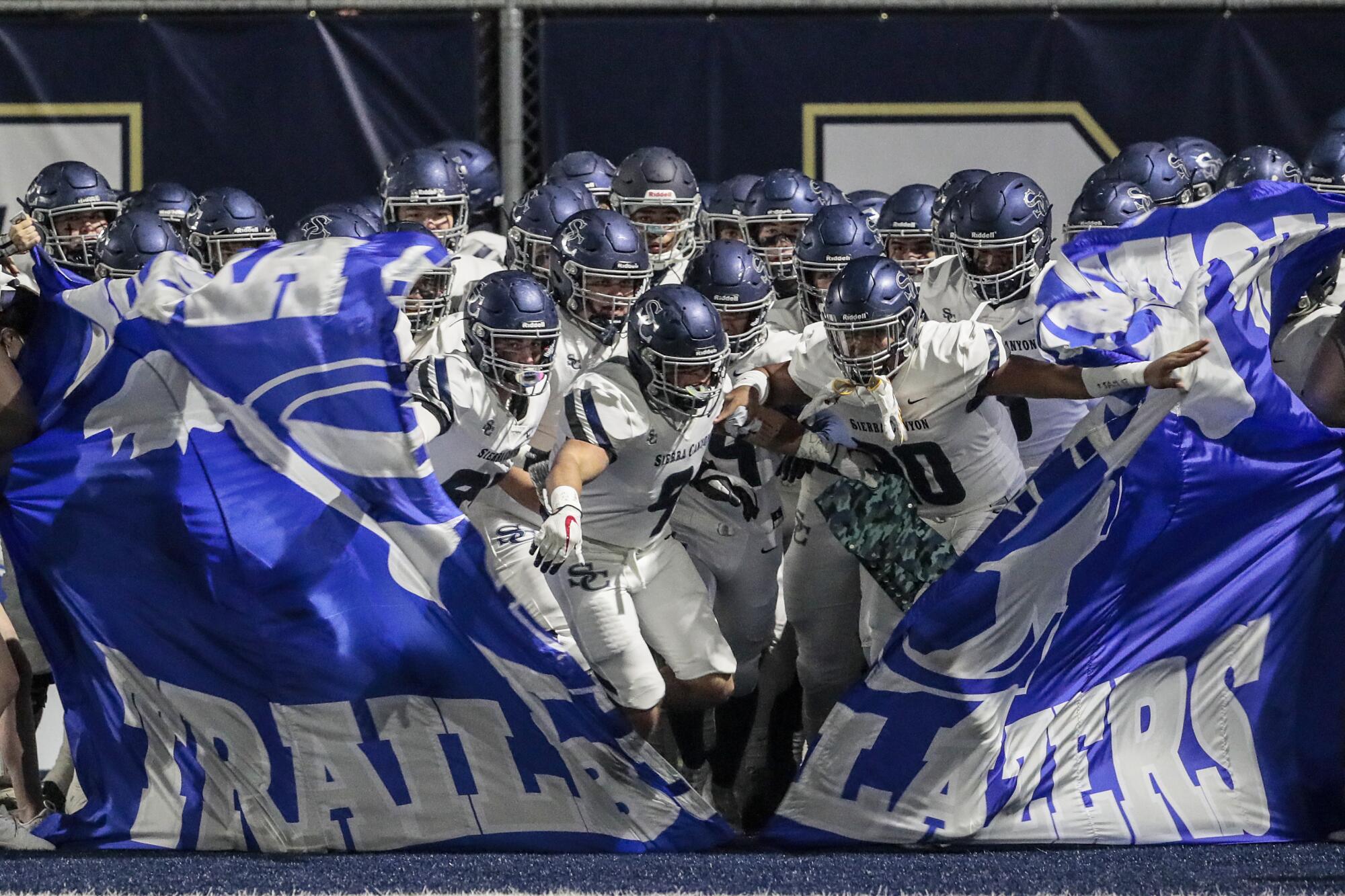 Sierra Canyon players enter the field before taking on St. John Bosco at Panish Family Stadium.