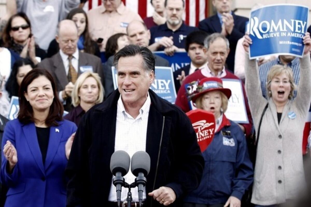 Mitt Romney speaks at a campaign event outside the city hall in Nashua, N.H., on Sunday.