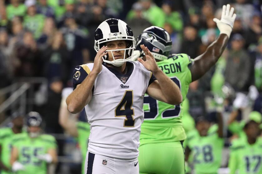 SEATTLE, WASHINGTON - OCTOBER 03: (EDITORS NOTE: Alternative crop) Greg Zuerlein #4 of the Los Angeles Rams reacts after missing a 44 yard field goal attempt to fall to the Seattle Seahawks 30-29 in the fourth quarter during their game at CenturyLink Field on October 03, 2019 in Seattle, Washington. (Photo by Abbie Parr/Getty Images)