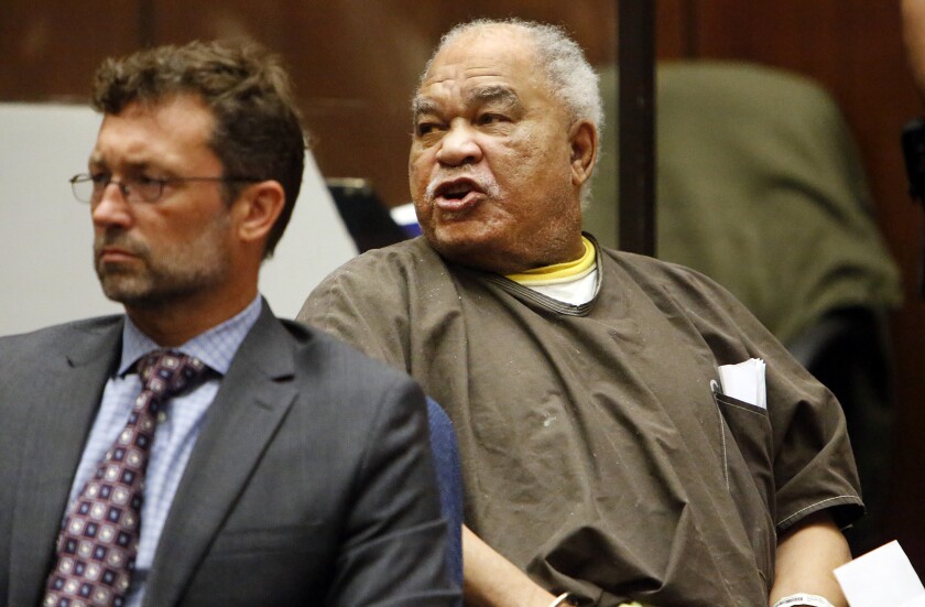 Convicted serial killer Samuel Little with his attorney in court