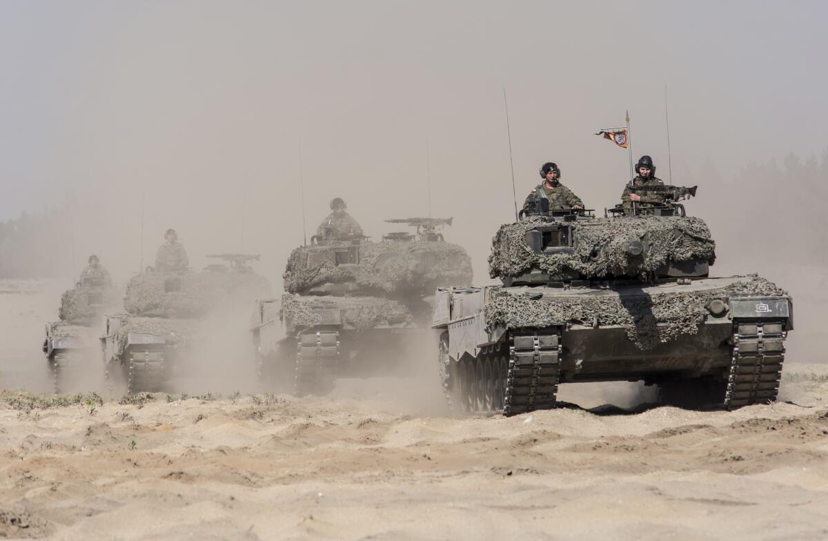 Service personnel in German-made Leopard 2 tanks