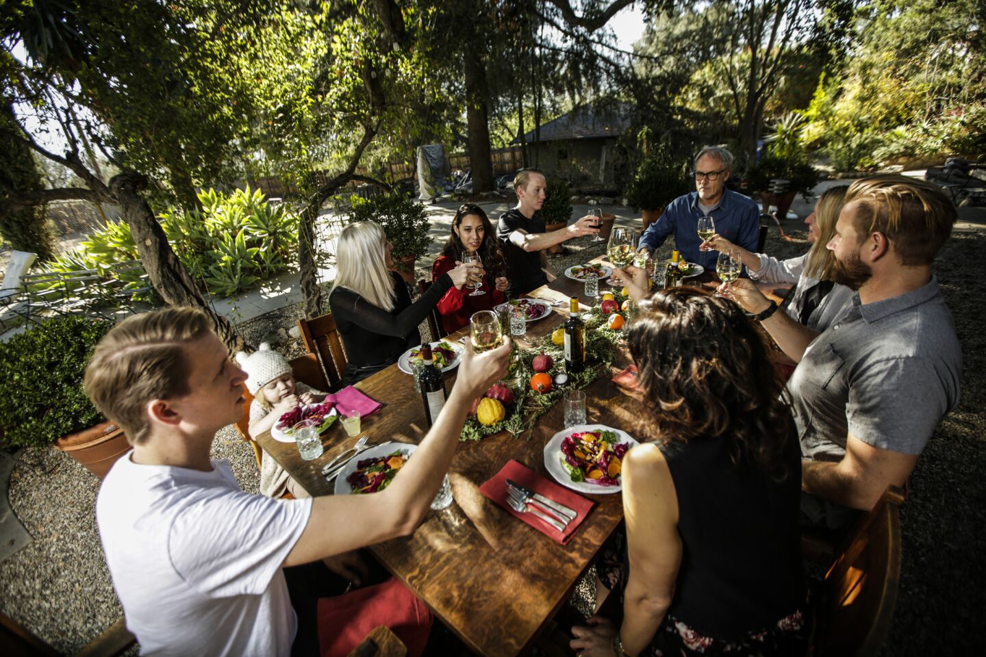 Andrea Crawford and her family partake in the holiday meal prepared at her home. The courses included rosemary steak skewers, radicchio salad, greens-stuffed flatbreads, kabocha squash and Meyer lemon tart.