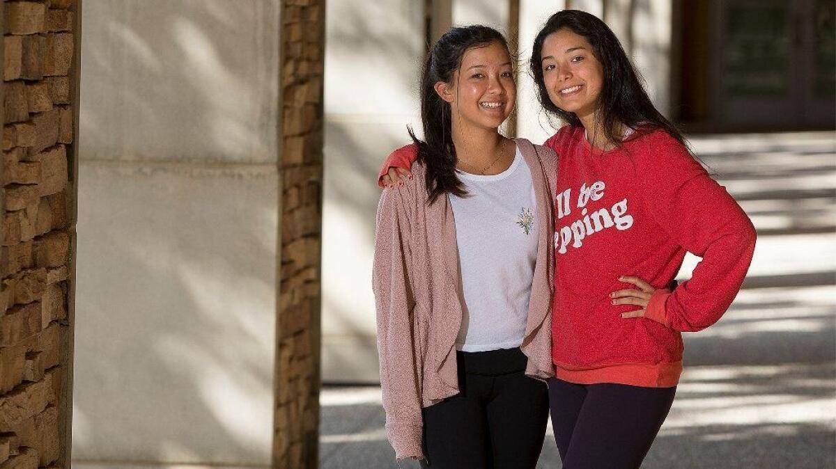 Twins Miya, left, and Hana Stauss, 15-year-old sophomores at Sage Hill School in Newport Coast, have created Peer Genius, a free tutoring website and app intended to match students needing academic help with students who can provide it.