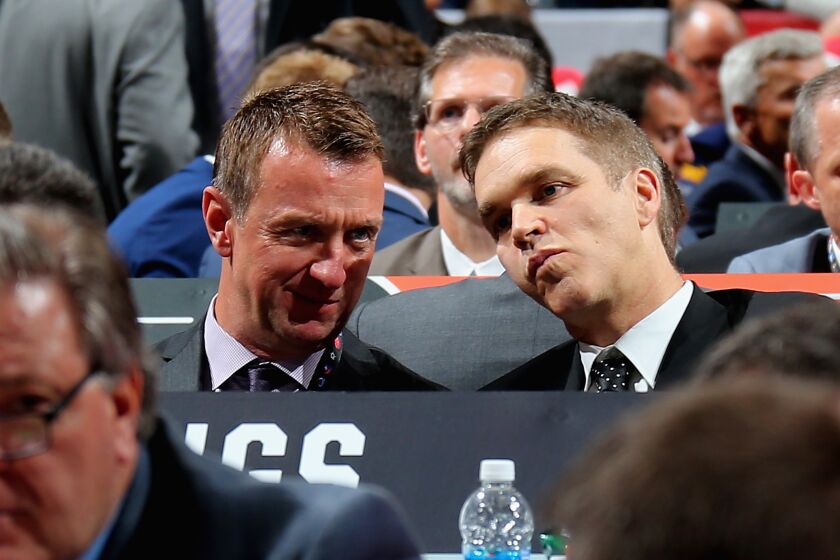 CHICAGO, IL - JUNE 23: (L-R) Rob Blake and Luc Robitaille of the Los Angeles Kings attend the 2017 NHL Draft.