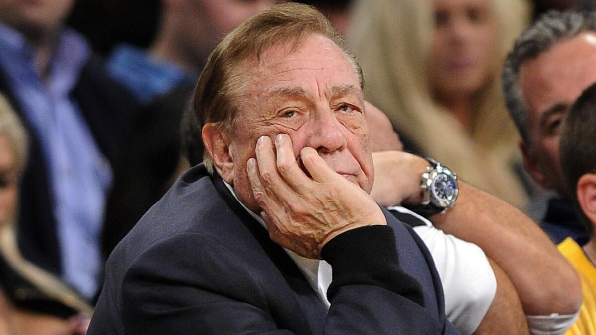 Former Clippers owner Donald Sterling looks on during a game at Staples Center in 2011. Sterling's lawyers have requested more time to respond to the NBA's countersuit.