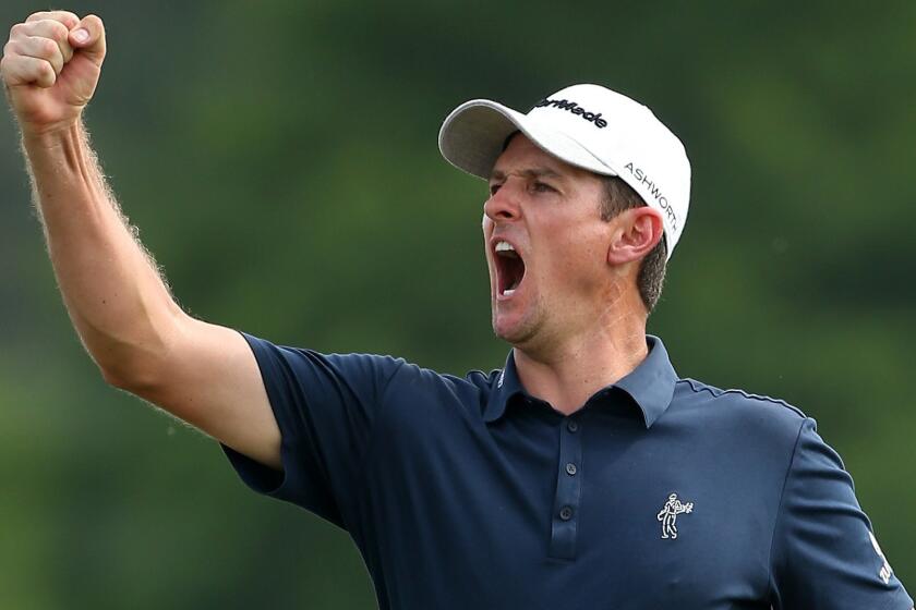Justin Rose celebrates his birdie putt on the 18th hole during the final round of his victory at the Zurich Classic in New Orleans on April 26.