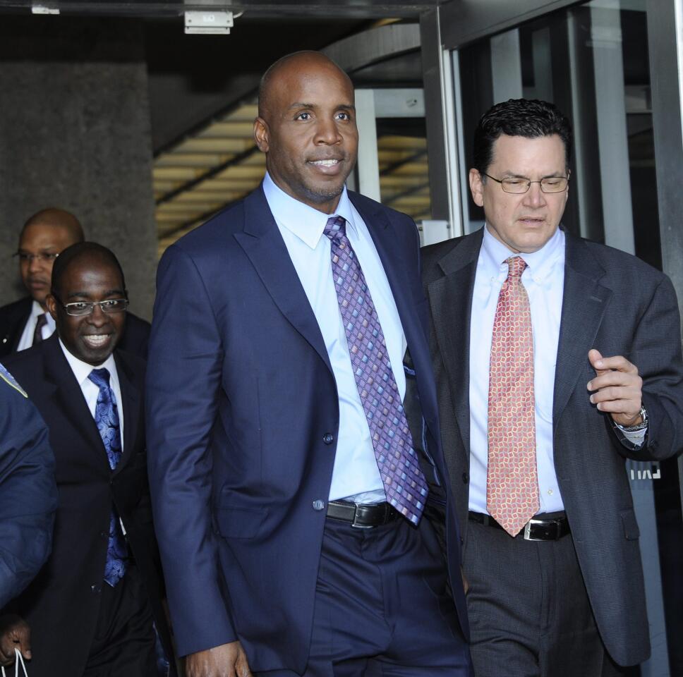 Former major leaguer Barry Bonds leaves the federal courthouse on March 31, 2011, after his perjury and obstruction trial in San Francisco.