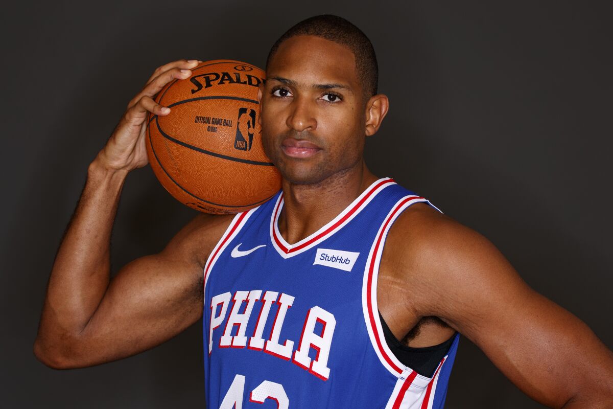 Al Horford poses for a photograph during the 76ers' media day.