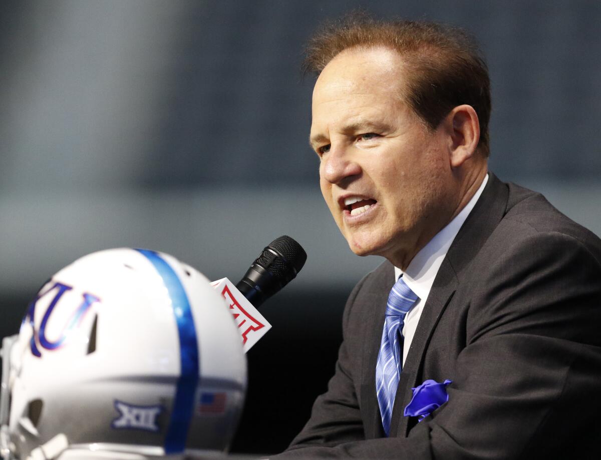 Kansas head coach Les Miles speaks on the first day of Big 12 Conference football media days on, July 15 in Arlington, Texas.