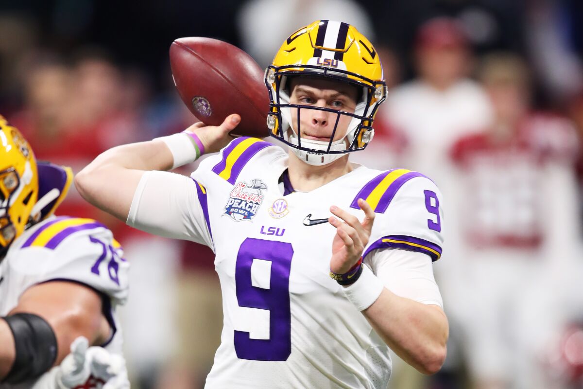 LSU quarterback Joe Burrow (9) is the front-runner to be selected No. 1 overall by the Cincinnati Bengals in this month's NFL Draft after a historic Heisman-winning season.