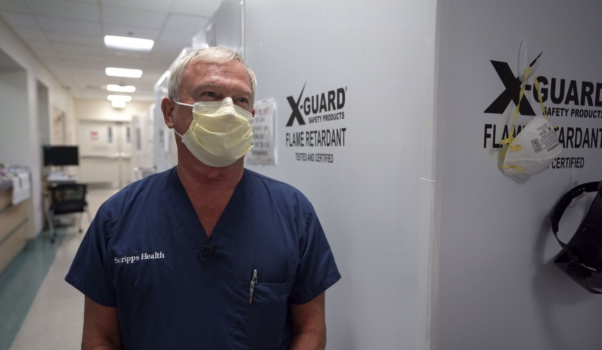 Dr. Dennis Amundson Medical Director speaks in the hallway at Scripps Mercy Hospital Chula Vista.