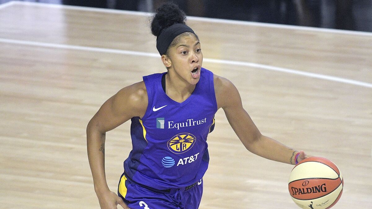 Candace Parker had 16 points, 12 rebounds and four assists to help the Sparks beat the Phoenix Mercury on Wednesday.