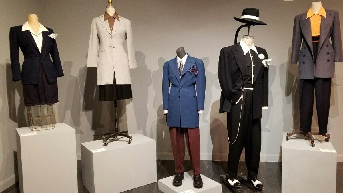 Zoot suits are part of an installation by John Carlos De Luna at the Vincent Price Art Museum.