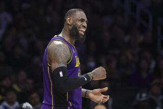 Los Angeles Lakers forward LeBron James (23) celebrates during the second half.
