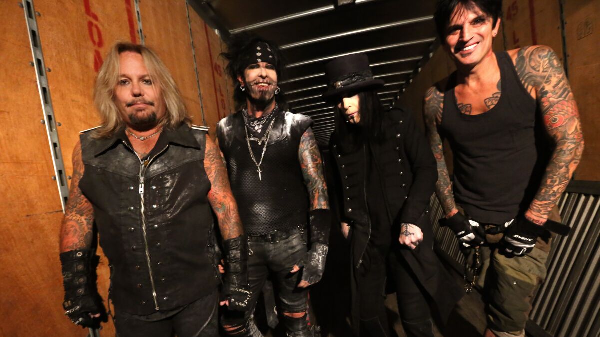 Mötley Crüe's Vince Neil, left, Nikki Sixx, Mick Mars and Tommy Lee in 2015.