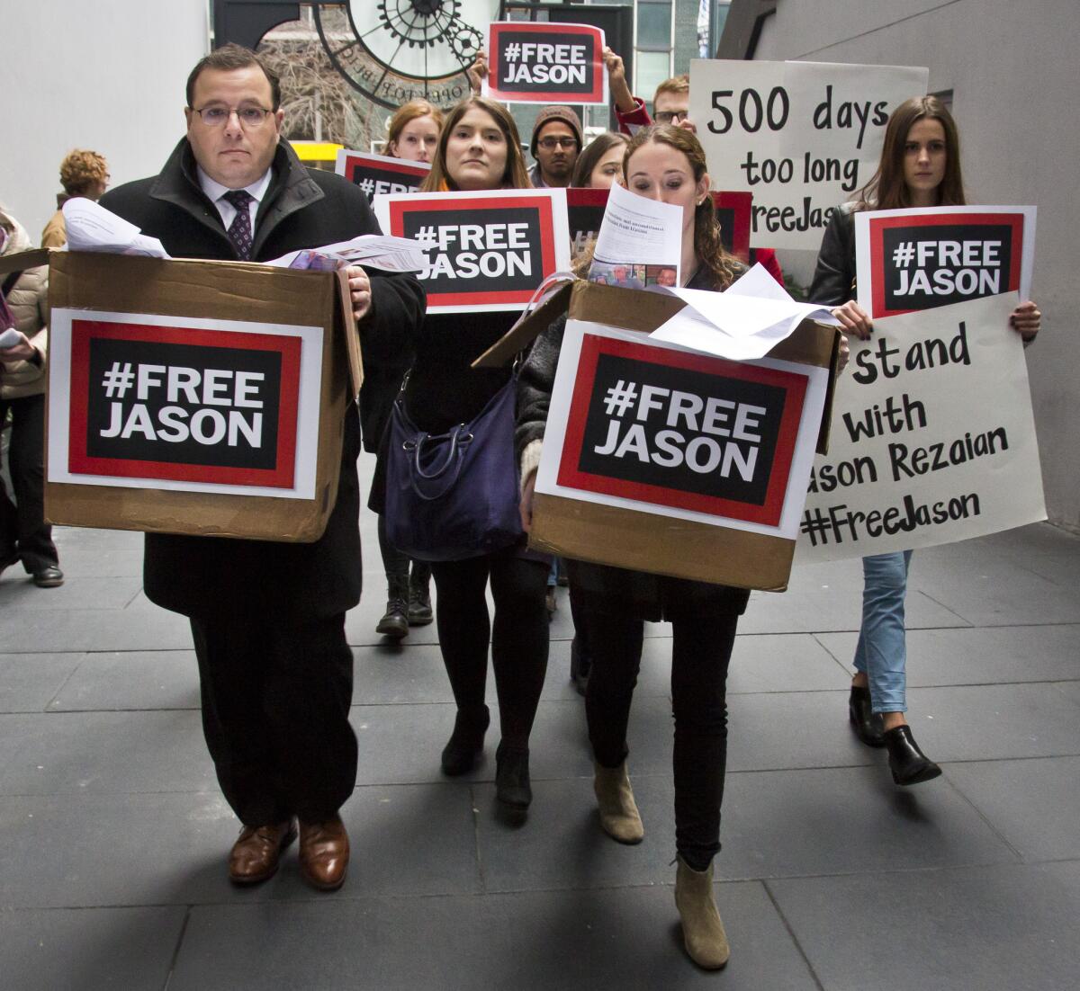 Ali Rezaian, far left, and supporters deliver a petition to Iran's United Nations mission in New York calling for the release of his brother, Washington Post reporter Jason Rezaian.