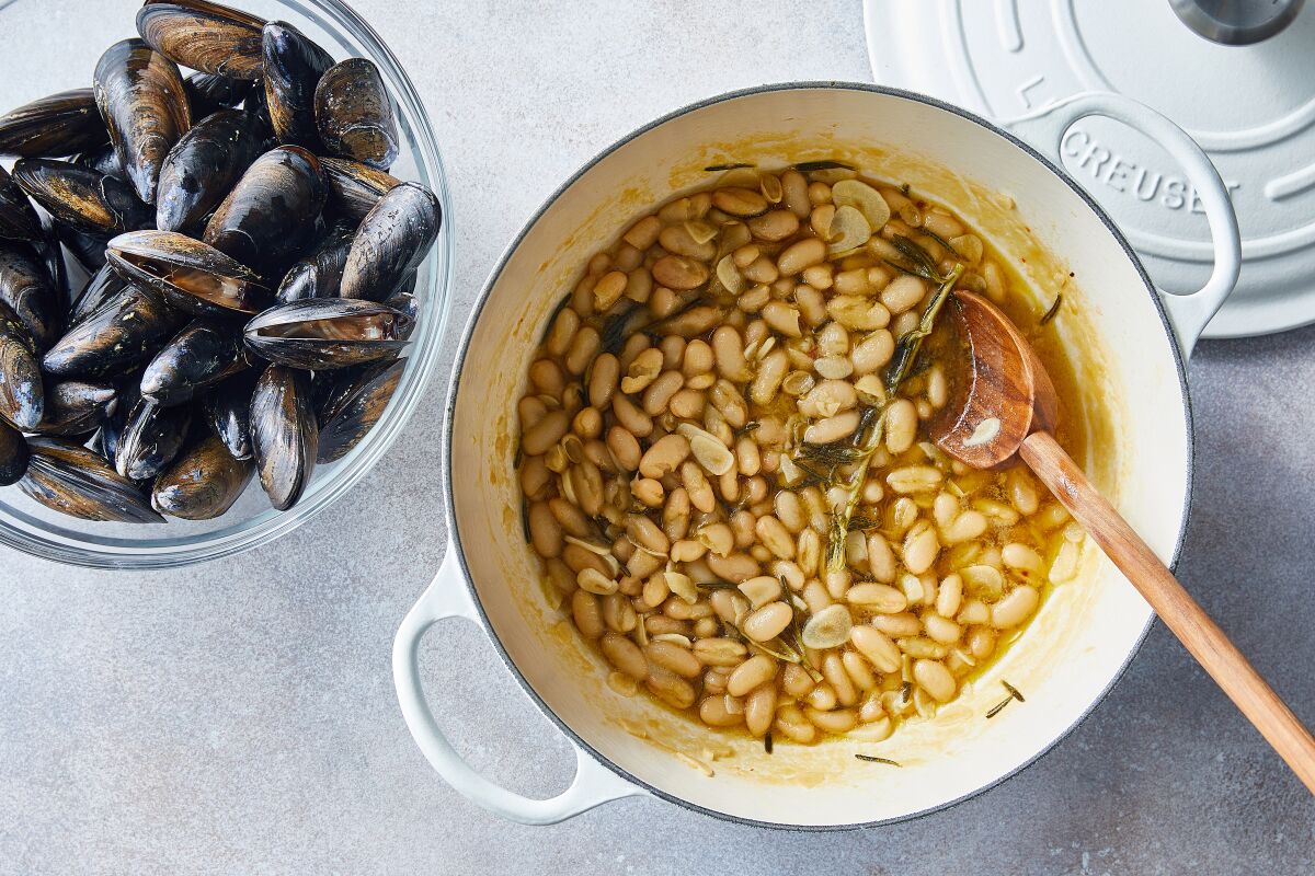 White beans are simmered with olive oil, garlic and red-pepper flakes