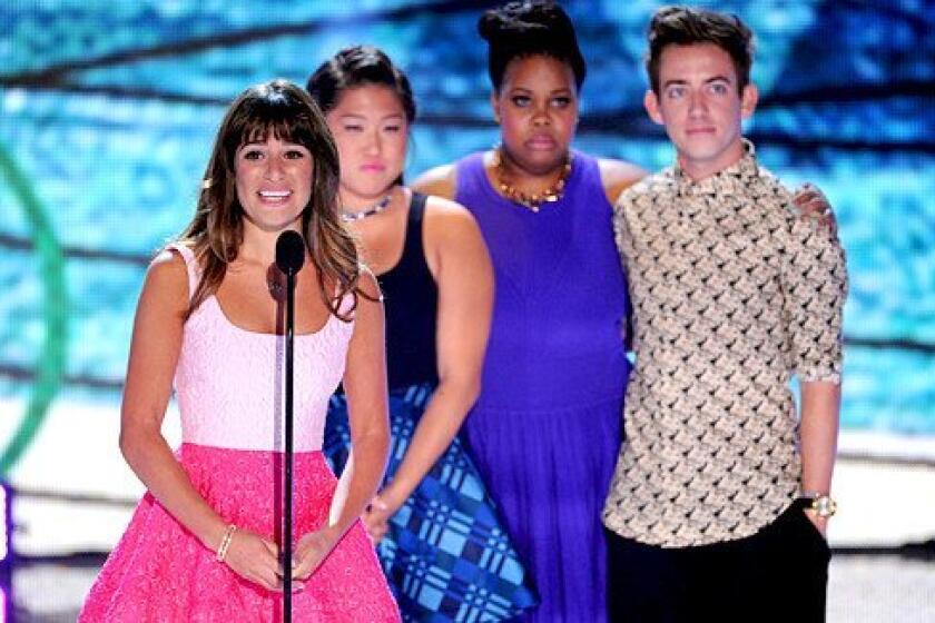 Actors Lea Michele, Jenna Ushkowitz, Amber Riley and Kevin McHale accept Choice TV Show: Comedy award for "Glee" onstage.
