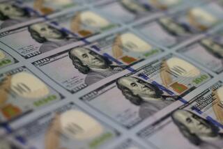 WASHINGTON, DC - MAY 20: Newly redesigned $100 notes lay in stacks at the Bureau of Engraving and Printing on May 20, 2013 in Washington, DC. The one hundred dollar bills will be released this fall and has new security features, such as a duplicating portrait of Benjamin Franklin and microprinting added to make the bill more difficult to counterfeit. (Photo by Mark Wilson/Getty Images)