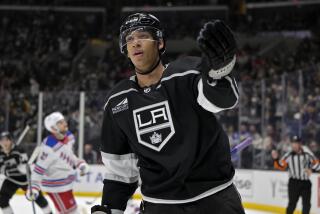 Kings' Quinton Byfield celebrates after scoring during the second period against the New York Rangers at Crypto.com Arena.