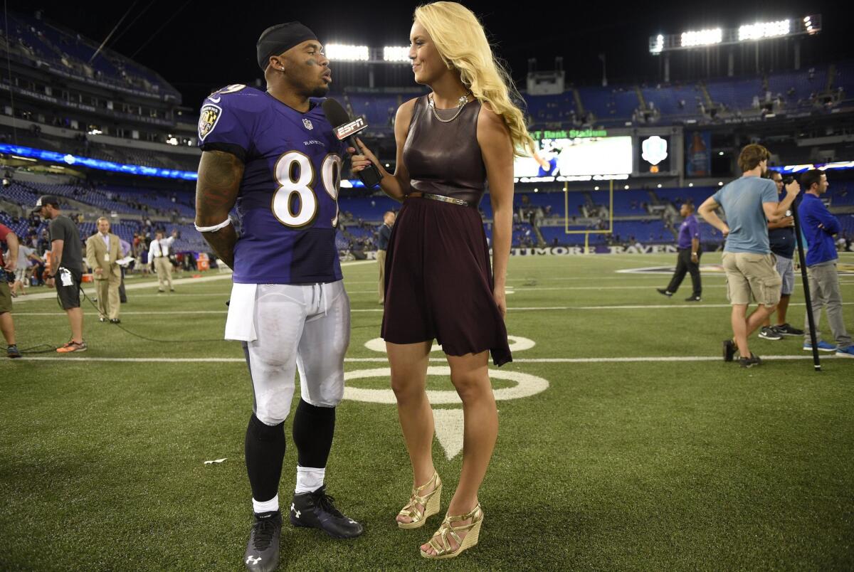 ESPN reporter Britt McHenry interviews Baltimore Ravens wide receiver Steve Smith on Sept. 11, 2014.