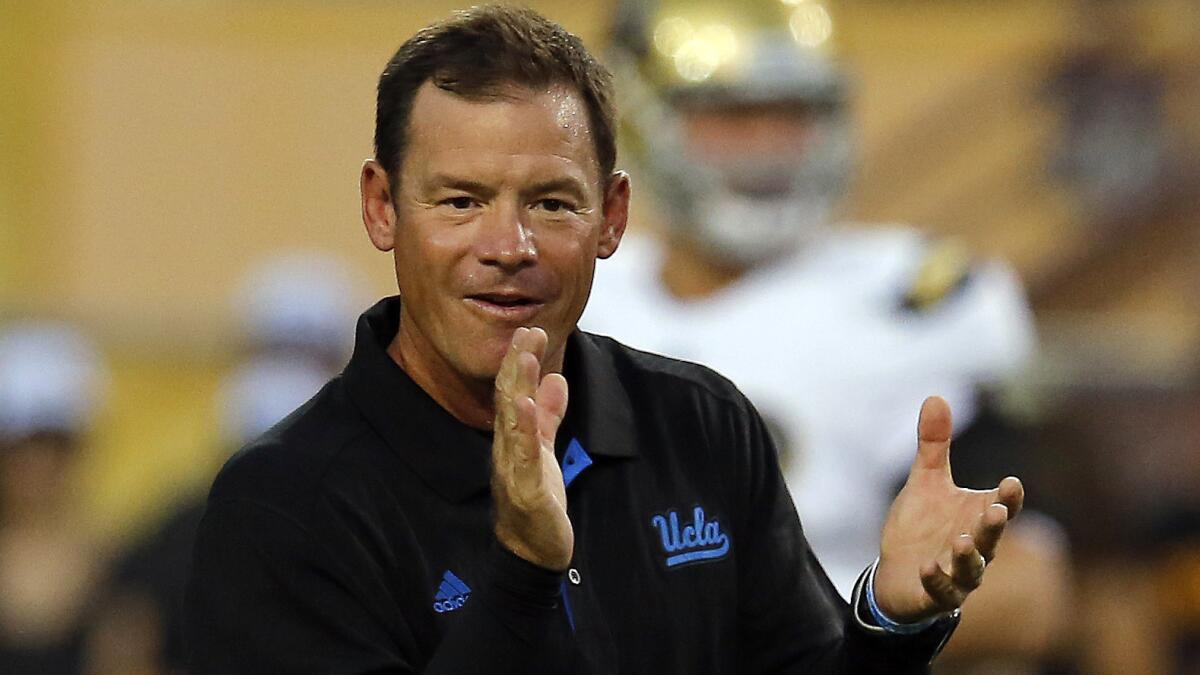 UCLA Coach Jim Mora claps before a game against Arizona State on Sept. 25.