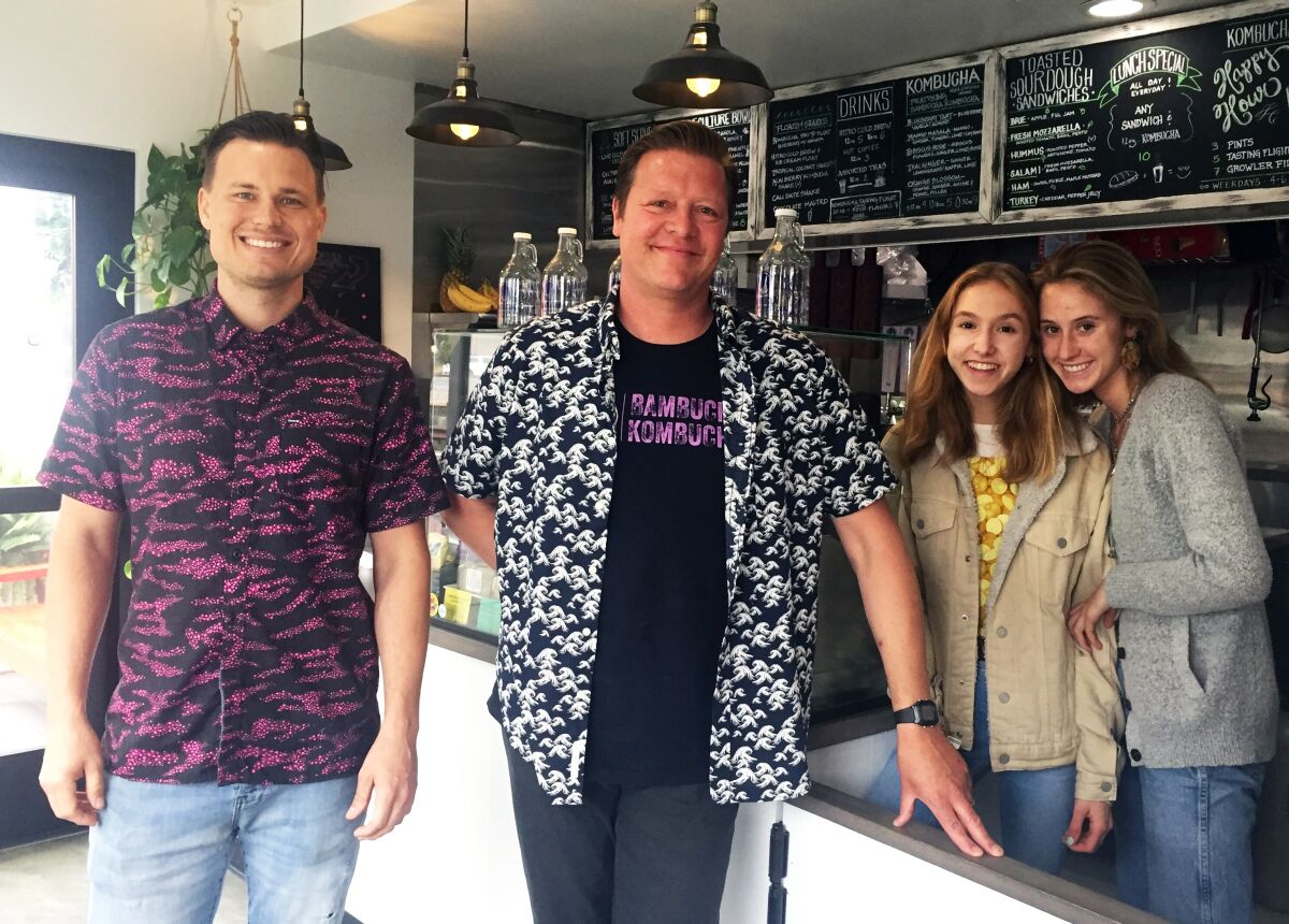Live Culture Cafe partners Patrick Otterson, left, and Michael ZonFrilli with employees Izzy Brown and Olive Wheadon in their new Leucadia restaurant.