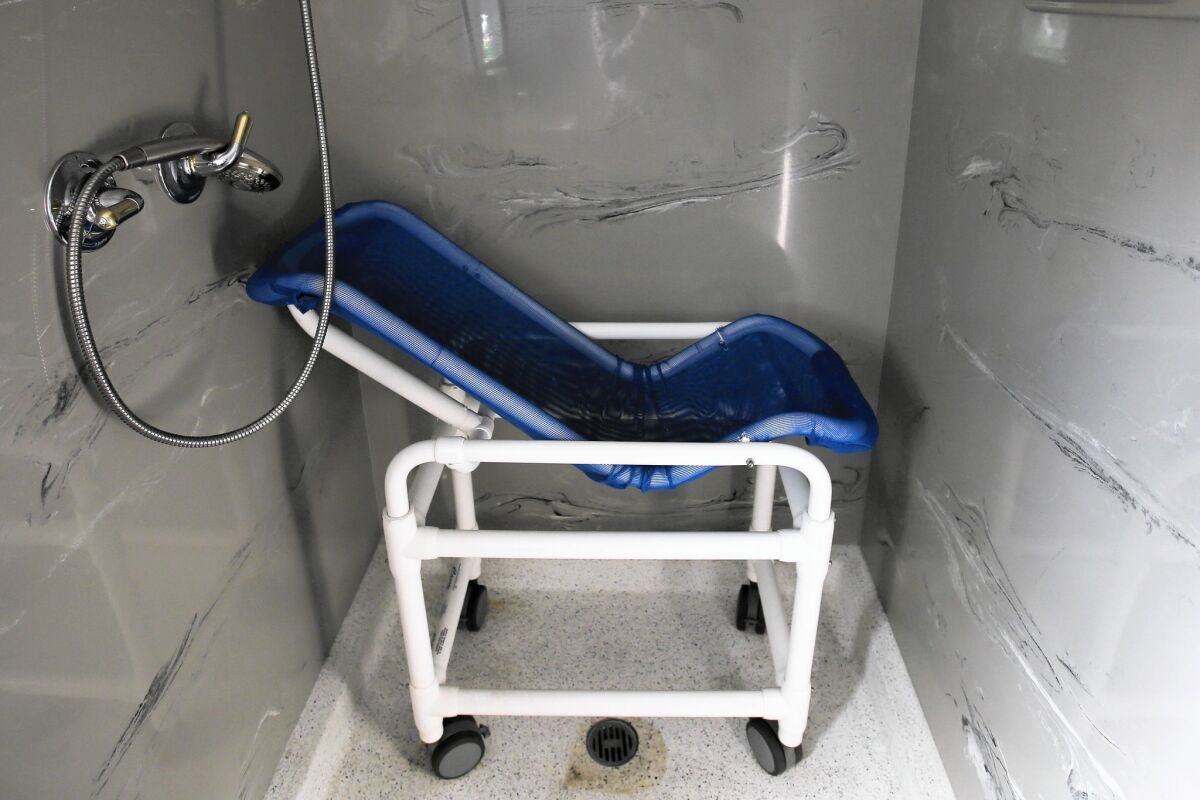 Eleanor Di Fronzo's home includes a special-needs-equipped shower. She and her husband have looked for a larger house that will be hospitable to their children.