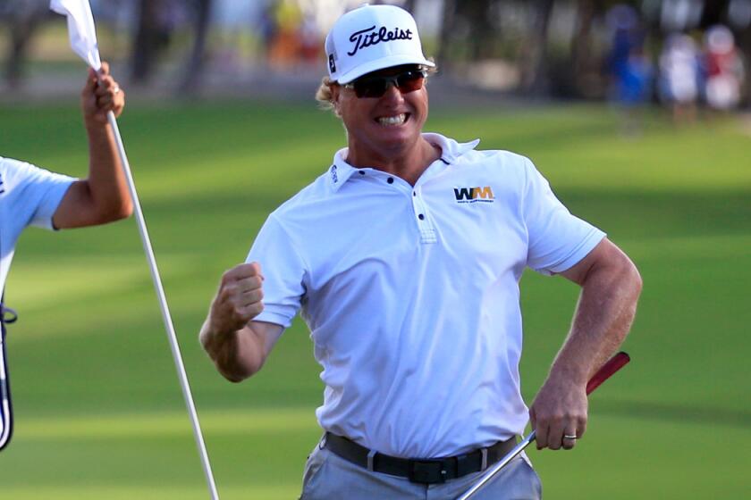 American Charley Hoffman celebrates after closing out his victory in the OHL Classic on Sunday.