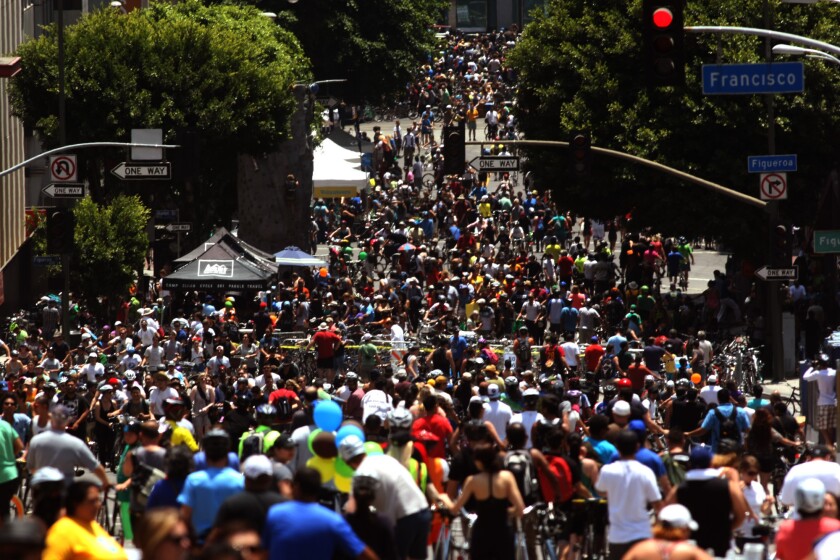 Hundreds of cyclists crowd the disembark and walk zone during last year's CicLAvia in Los Angeles. L.A. County is now the populous county in the country.