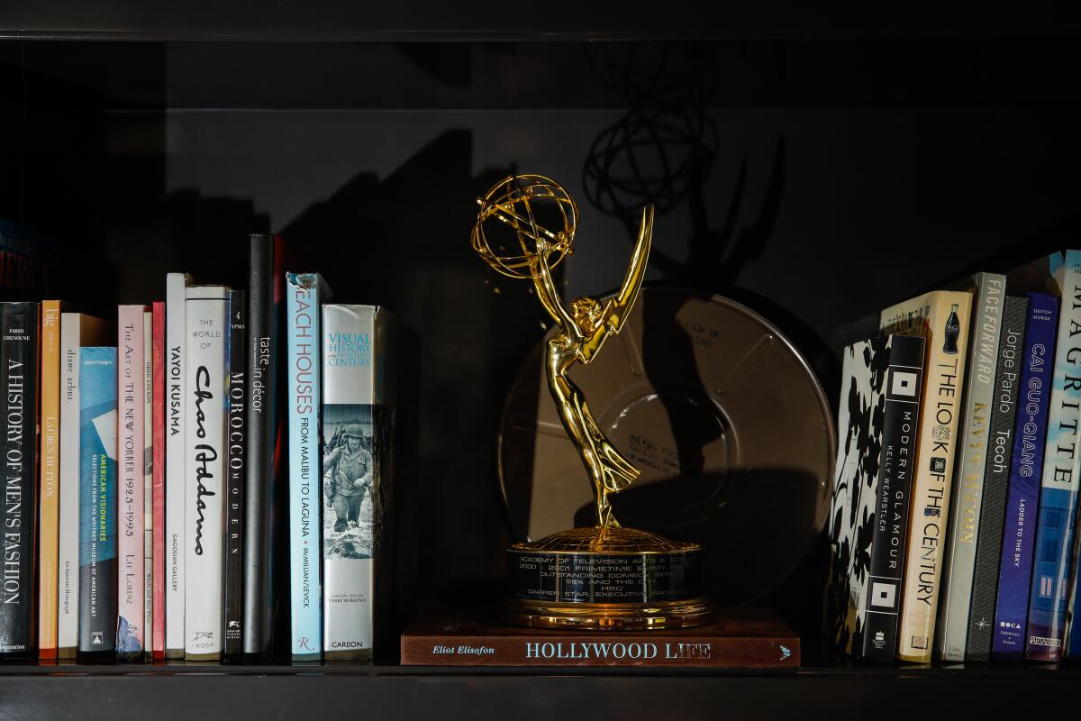 An Emmy for "Sex and the City" sits on a bookcase at Darren Star's Bel-Air home.