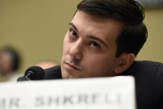 FILE - Former Turing Pharmaceuticals CEO Martin Shkreli attends the House Committee on Oversight and Reform Committee hearing on Capitol Hill in Washington, Feb. 4, 2016. A federal judge on Friday, Jan. 14, 2022 ordered Shkreli to return $64.6 million in profits he and his company reaped from inflating the price of the life-saving drug Daraprim and barred him from participating in the pharmaceutical industry for the rest of his life. (AP Photo/Susan Walsh, File)