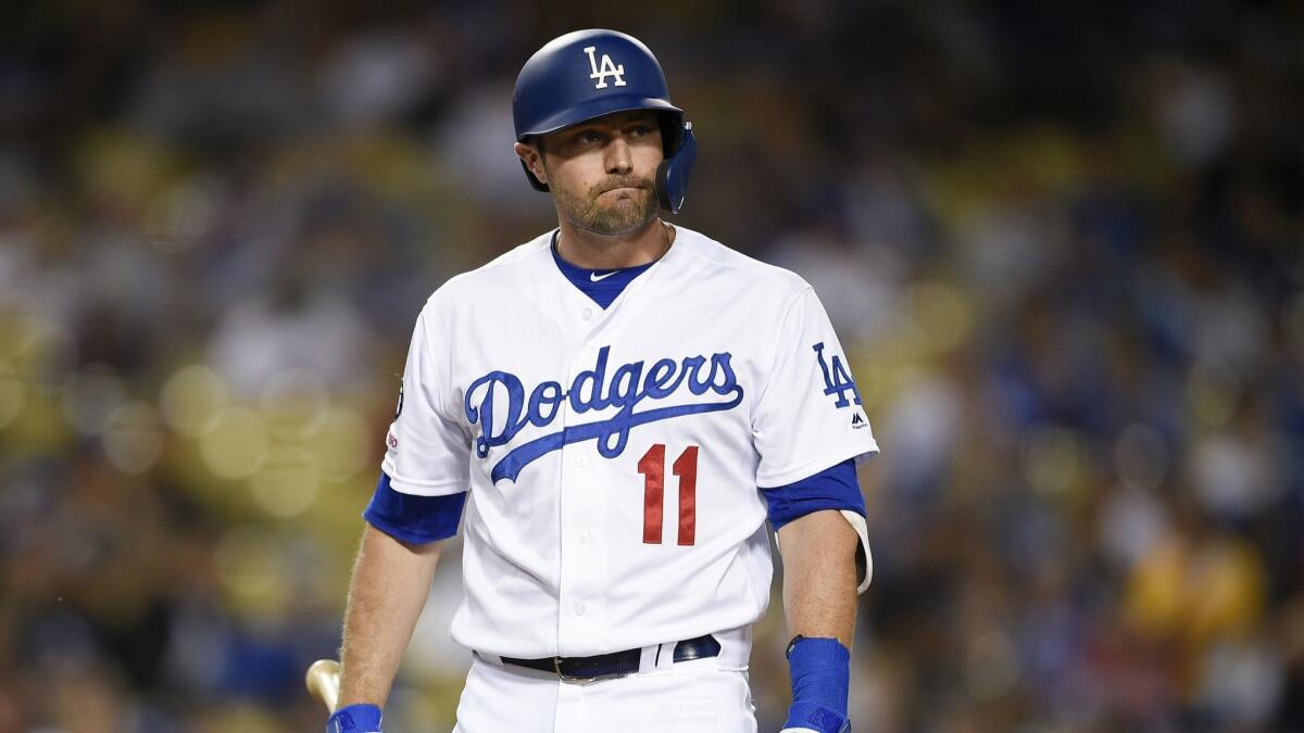 Dodgers center fielder A.J. Pollock reacts after being thrown a strike against the San Francisco Giants at Dodger Stadium on April 1.