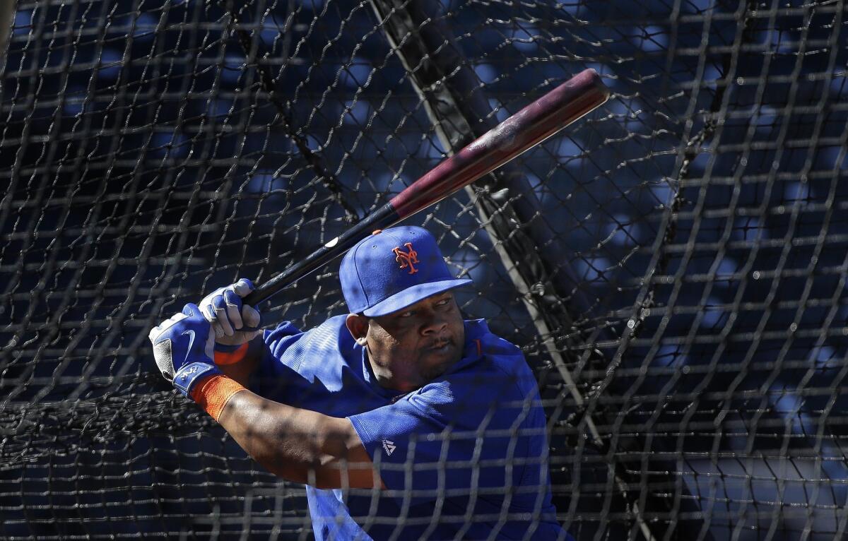 New York Mets' Juan Uribe, who started the season with the Dodgers, takes batting practice on Oct. 23.