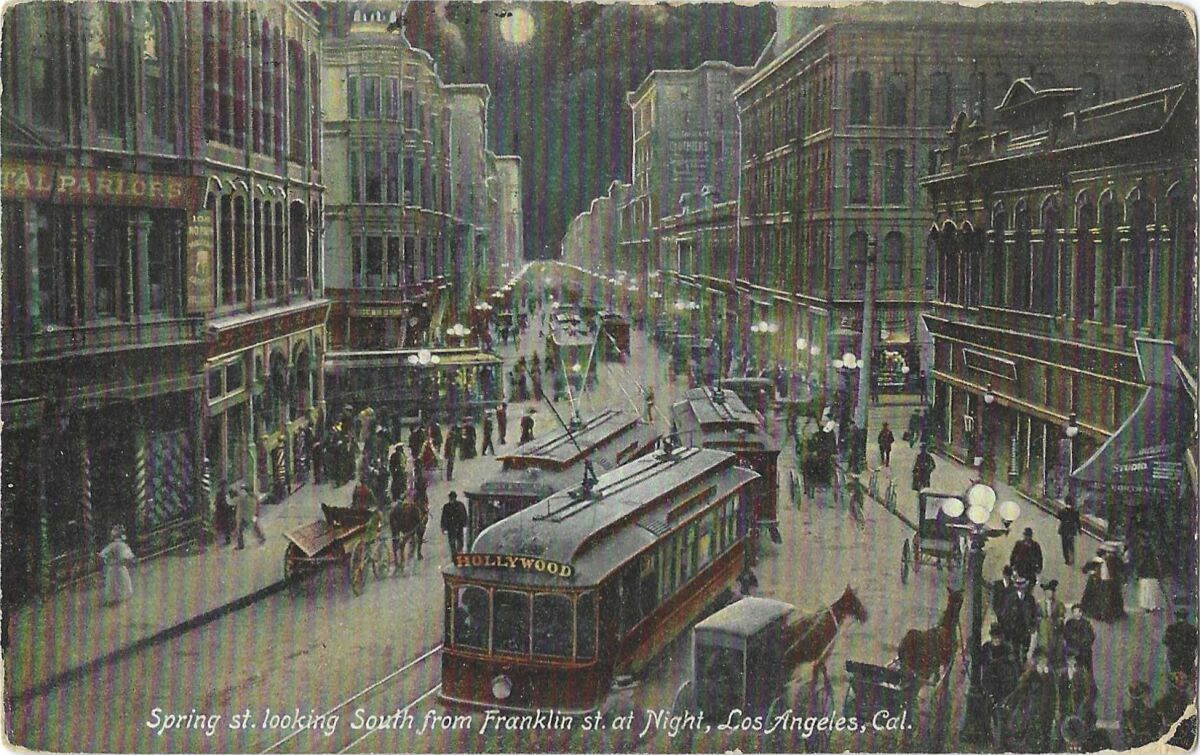 Vintage postcard depicts downtown's Spring Street at night