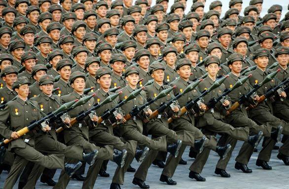 North Korean soldiers march in a parade in Pyongyang, marking the 60th anniversary of the country's founding. North Korean leader Kim Jong Il did not attend the event, adding to recent speculation that he may be ill.