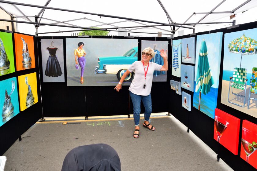 Catherine Dzialo-Haller shows her paintings at the 2022 La Jolla Art & Wine Festival.