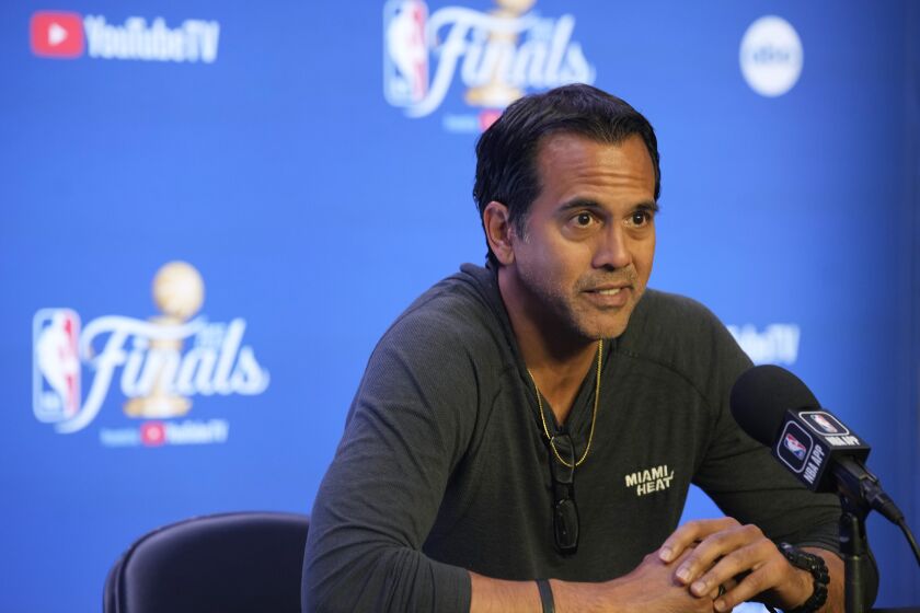 Miami Heat head coach Erik Spoelstra responds to a question at a news conference before practice for Game 2 of the NBA Finals, Saturday, June 3, 2023, in Denver. (AP Photo/David Zalubowski)