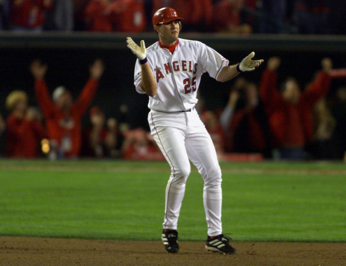 Troy Glaus celebrates his two-run double in the bottom of the ninth against the Giants.