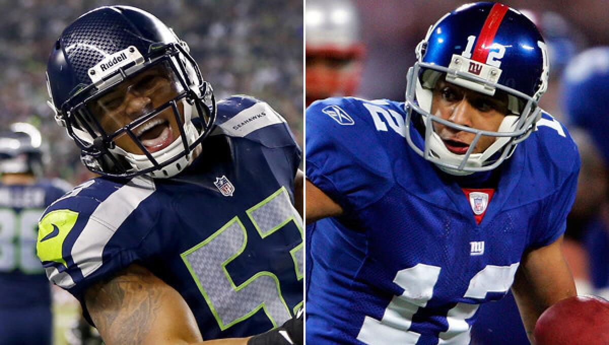 Seattle Seahawks linebacker Malcolm Smith, left, and former New York Giants wide receiver Steve Smith are on the verge of joining an elite group of brother combinations that have won Super Bowl titles.
