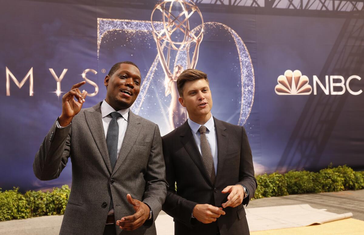 Primetime Emmy Awards co-hosts Michael Che, left, and Colin Jost.