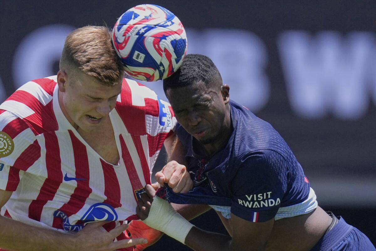 Atletico Madrid's Alexander Sorloth, left