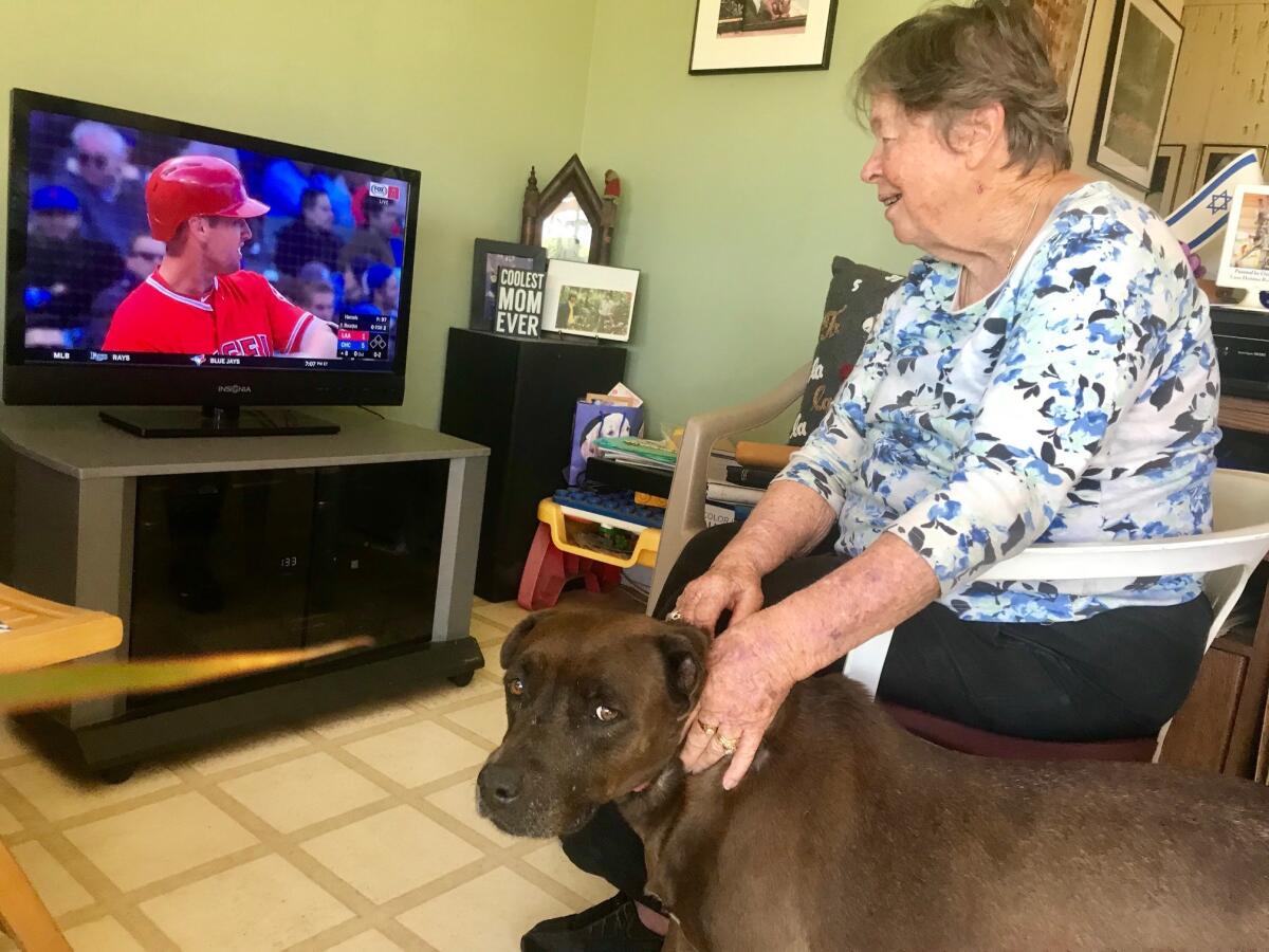 Anne Goldfarb has been a Dodgers fan since 1958, but she's now watching Angels games on TV.