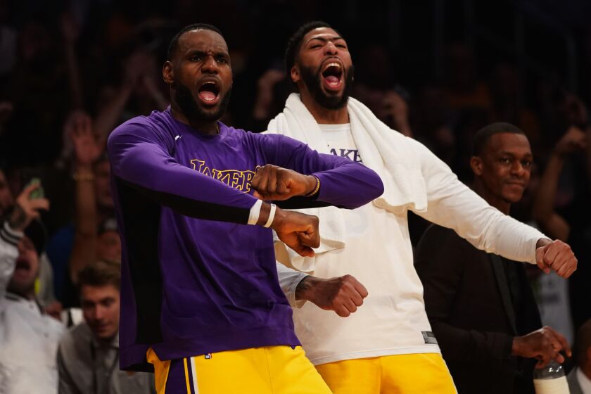 Kent Nishimura  Los Angeles Times LAKERS teammates LeBron James and Anthony Davis had plenty to cheer for during their team’s 120-91 rout of Memphis.