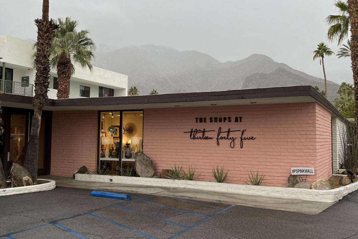 Exterior of a pink midcentury building in Palm Springs.