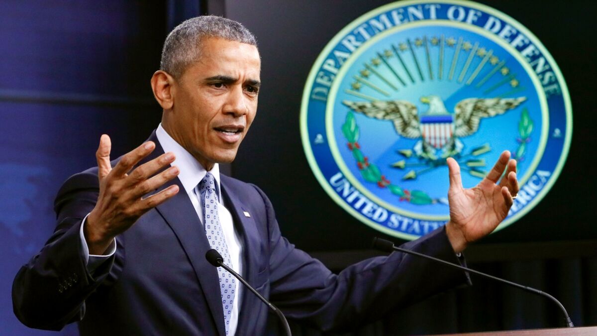 President Barack Obama talks about the war on terrorism and efforts to degrade and destroy the Islamic State group during a news conference at the Pentagon on Aug. 4.