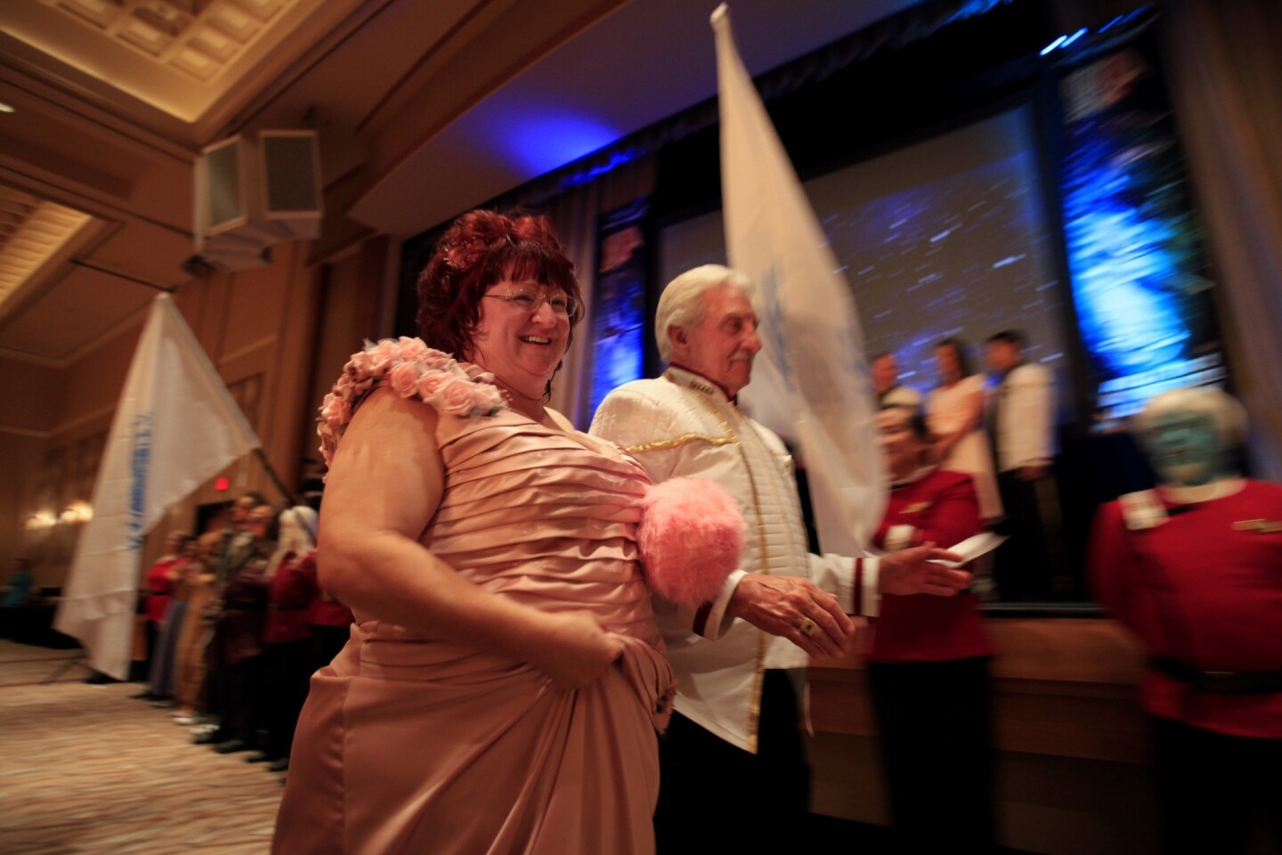 Amy Campbell, 49, is escorted by her father Fred Campbell during Amy and Mark's wedding at the annual "Star Trek" convention at the Rio hotel and casino in Las Vegas.